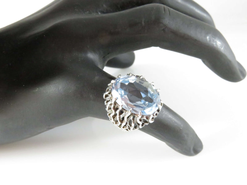 c1976 UK Oval Synthetic Aquamarine Set in Pierced Sterling Silver Band Statement