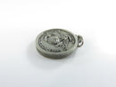 Back of USMC silver-tone charm beside ruler with attached jump ring
