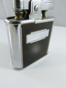 Bottom of Ronson Whirlwind lighter with fill cap and Newark New Jersey markings