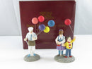 Undersides of both porcelain figurines showing Disney, Department 56, Made in Taiwan, and R.O.C. markings.