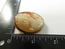 Back of shell cameo showing hairline crack visible under direct light