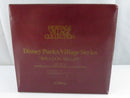 Front of burgundy Department 56 Heritage Village Collection Disney Parks Village Series Balloon Seller set of 2 box.