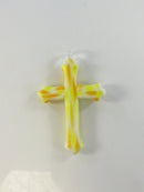Side view of glass cross pendant showing clear glass hanging loop