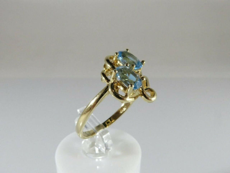14K Yellow Gold Ring Size 6 3/4 with a Pair 6mm x 4mm Oval Cut Blue Topaz product image for Just Stuff I Sell, clear front view, neutral background, original listing photo, optimized descriptive alt text, centered composition variant 2