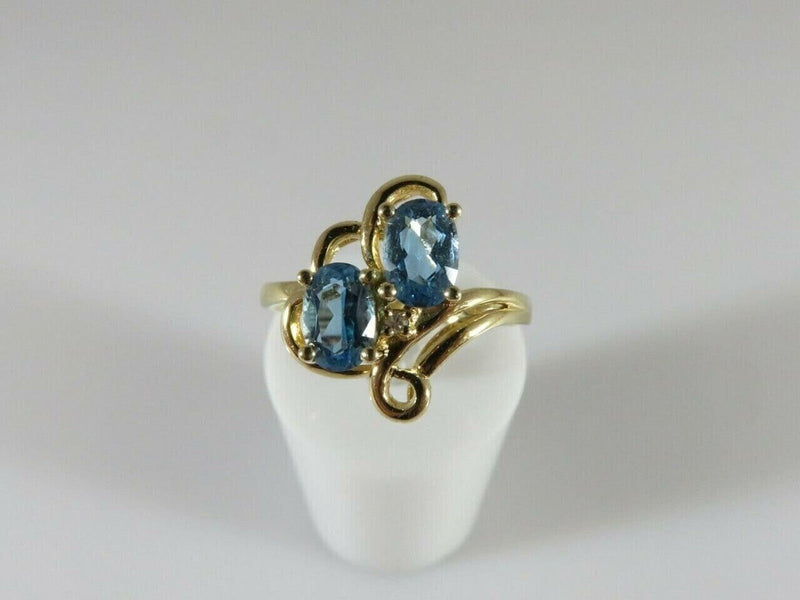 14K Yellow Gold Ring Size 6 3/4 with a Pair 6mm x 4mm Oval Cut Blue Topaz product image for Just Stuff I Sell, clear front view, neutral background, original listing photo, optimized descriptive alt text, centered composition