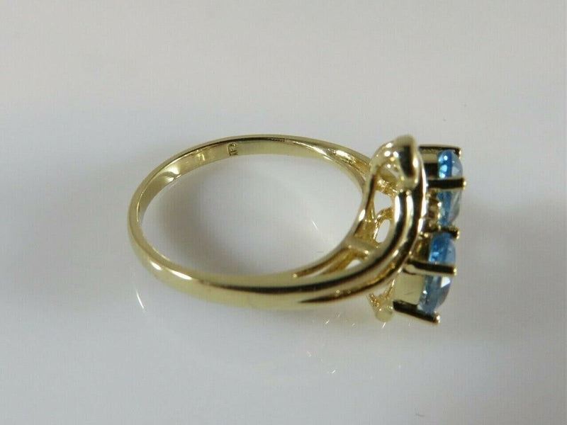 14K Yellow Gold Ring Size 6 3/4 with a Pair 6mm x 4mm Oval Cut Blue Topaz product image for Just Stuff I Sell, clear front view, neutral background, original listing photo, optimized descriptive alt text, centered composition variant 6