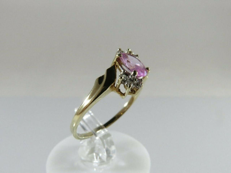 Oval Pink Solitaire Stone 10K Ring w/ 6 CZ Accents Size 5.75 10K Yellow Gold product image for Just Stuff I Sell, clear front view, neutral background, original listing photo, optimized descriptive alt text, centered composition variant 3