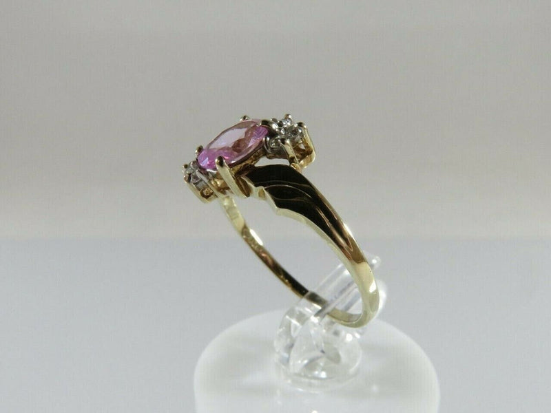 Oval Pink Solitaire Stone 10K Ring w/ 6 CZ Accents Size 5.75 10K Yellow Gold product image for Just Stuff I Sell, clear front view, neutral background, original listing photo, optimized descriptive alt text, centered composition variant 4