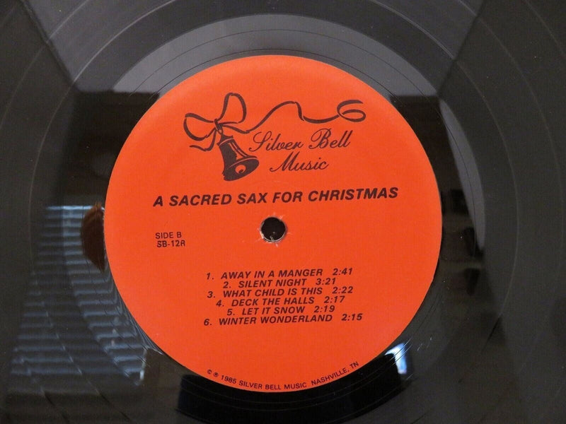 1985 A Sacred Sax for Christmas Donnie Sanders Silver Bell Music SB-12 Vinyl LP product image for Just Stuff I Sell, clear front view, neutral background, original listing photo, optimized descriptive alt text, centered composition variant 4