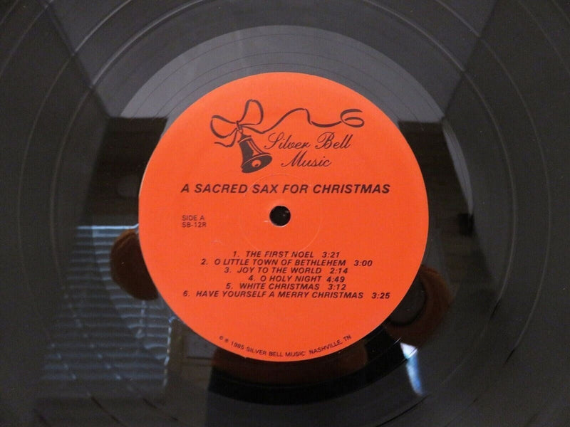 1985 A Sacred Sax for Christmas Donnie Sanders Silver Bell Music SB-12 Vinyl LP product image for Just Stuff I Sell, clear front view, neutral background, original listing photo, optimized descriptive alt text, centered composition variant 3