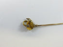 Reverse view of floral stick pin head and stem