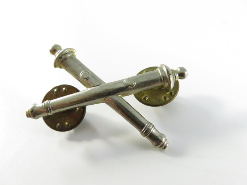 Post WWII US Army Artillery Crossed Cannons Collar Insignia Silver Tone Clutchback Hat Lapel Badge S-21