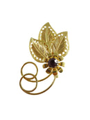 Vintage Swirling Pierced Leaf Brooch with Purple Rhinestone Pierced Leaves — Gold — front view