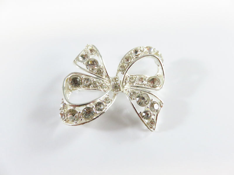 Rhinestone Bow Pin Silver Tone Bow with Safety Latch 1 1/2" x 1 1/2"