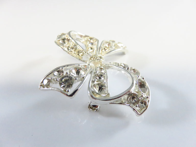 Rhinestone Bow Pin Silver Tone Bow with Safety Latch 1 1/2" x 1 1/2"