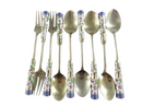 Vintage Seoul Korea Enameled White Metal Set of 6 Spoons and 3 Forks Souvenir — front view