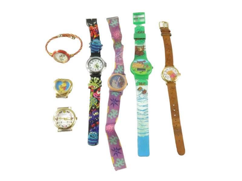 A Grouping of Character Style Watches, Lion King, Pooh, TMX Monster , Snowman — front view