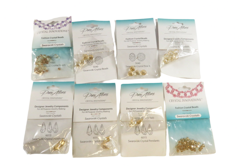 Grouping of Golden Crystal Innovations Swarovski Crystals Fashion Beads New Old Stock — front view
