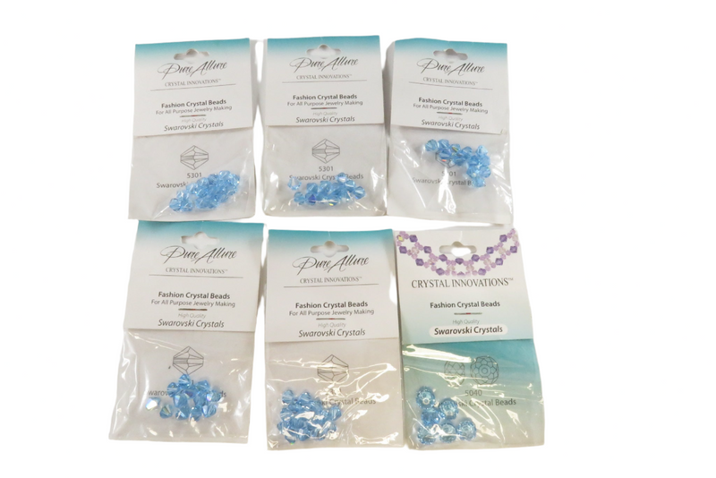 Grouping of Blue Crystal Innovations Swarovski Crystals Fashion Beads New Old Stock — front view