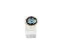 Pre-owned Costume Silver Tone Fashion Ring with Oval Synthetic Blue Spinel — Silver • Topaz — front view