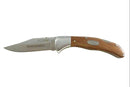 Folding knife with wooden handle and metal blade on a white background