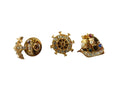 Vintage Collection of 3 Nautical Themed Pins Anchor, Boat, Wheel — front view