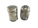 Two silver salt and pepper shakers on a white background