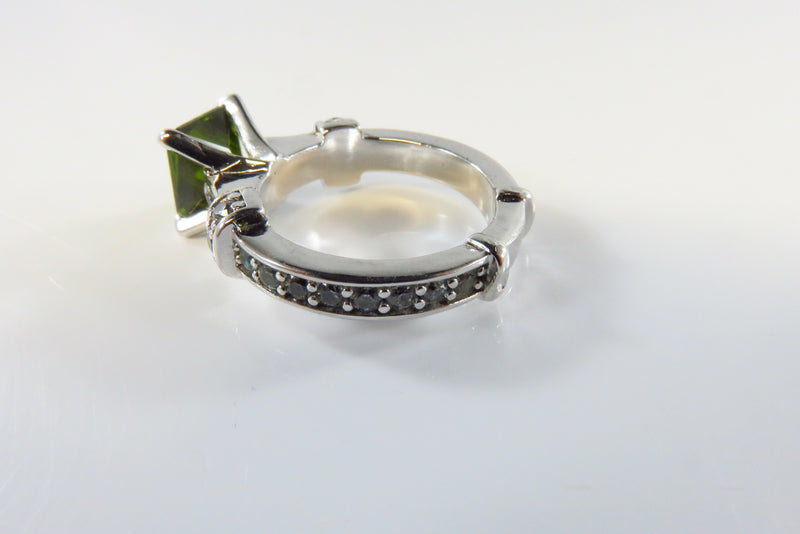 Nice Pre-owned Green Stone Solitaire in White Metal With Crystal Accents
