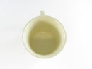 Top view of cream-colored ceramic mug