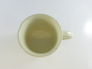 Top view of cream-colored ceramic mug