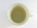 Top view of cream-colored glazed ceramic mug