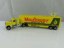 Side view of Hot Wheels Yellow FORD LTL Mayflower Trailer
