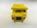 Vintage Hot Wheels 1980s Workhorses CAT Dump Truck Yellow Caterpillar 777 Pivoting Bed Hong Kong 1/64 Mattel Series