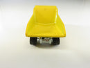 Vintage Hot Wheels 1980s Workhorses CAT Dump Truck Yellow Caterpillar 777 Pivoting Bed Hong Kong 1/64 Mattel Series
