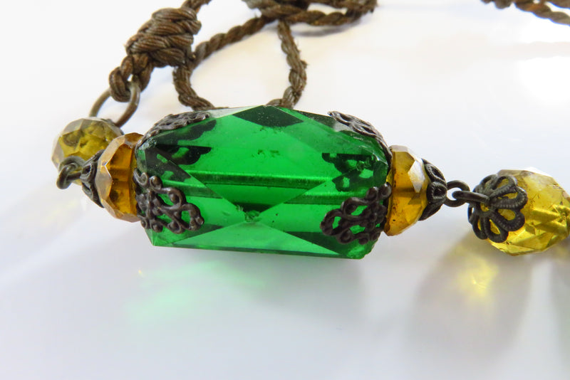 Unusual Antique Czechoslovakia Faceted Green and Orange Pendant on Twisted Rope