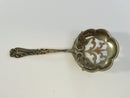 Art Nouveau silver spoon with pierced bowl
