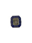1934 Chicago World's Fair enamel pin with Art Deco design
