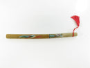 Close-up of hand-painted dragon motif on bamboo handle of mini katana letter opener
