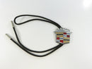 Full view of Cadillac bolo tie with black nylon cord