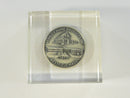 Stanley Home Products commemorative coin in lucite block