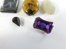 Loose Gemstone and Bead Lot with Hematite Intaglio and Synthetic Stones Purple Stone Plastic Oval Unidentified White Sto