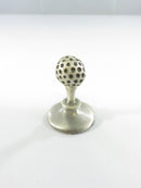 Side view of pewter chess pawn