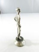 Side view of pewter golf chess piece