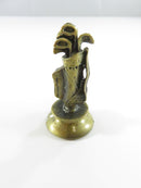 Brass colored chess piece with flared base