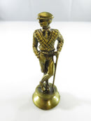 Brass colored chess piece on flared base