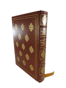 Leather bound book with gilt accents and ribbon marker