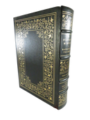 Leather-bound book with gilt accents and title "A Distant Mirror" by Barbara W. Tuchman
