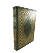 Leather bound book with gilt accents