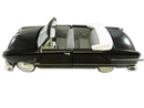 Left-side view of black 1951 Ford Custom Convertible Coupe 1:32 diecast model with open driver door and white interior.