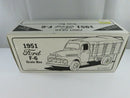 First Gear 1951 Central Tractor F-6 grain box truck diecast model in foam packaging, side view showing red cab and wood-grain box